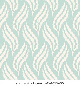 Pastel blue seaweed cut out seamless pattern with speckled texture. Underwater sea life light blue and cream vintage summer holiday background. Hand drawn chambray blue resort block print design.