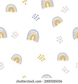 Pastel color seamless pattern rainbows and drops. Design for T-shirt, textile and prints. Hand drawn vector illustration for decor and design.
