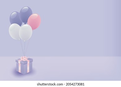 Pastel colored balloons and present box
