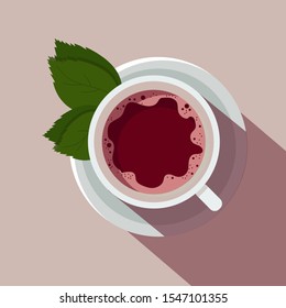 Pastel cup with tea and mint leaves