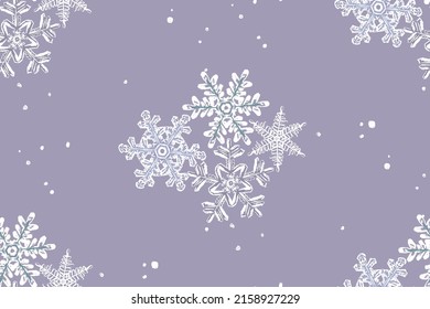 Pastel delicate winter seamless pattern. Snowflakes on a lilac background.