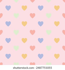 corazón pastel patrón sin fisuras sobre fondo rosa.
