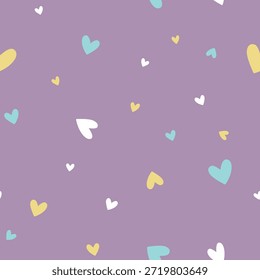 Patrón sin fisuras de corazones pastel sobre fondo púrpura suave