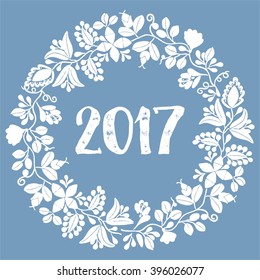 Pastel laurel vector wreath New Year 2017 white frame isolated on blue background