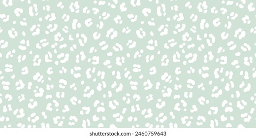 Pastel leopard skin print seamless pattern. Cheetah skin flat style white on sage mint green background. Hand drawn gender neutral pastel leopard print background. Soothing calm pastel safari design.