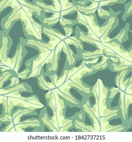 Pastel seamless random pattern with abstract simple monstera ornament. Light green and yellow pale tones tropic artwork. Backdrop for fabric design, textile print, wrapping, cover. Vector illustration