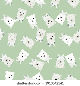 Pastel tones seamless doodle pattern with white polar bear random print. Light green background. Vector illustration for seasonal textile prints, fabric, banners, backdrops and wallpapers.