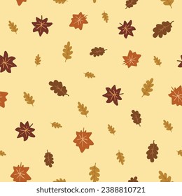 A pastel yellow seamless pattern with falling autumn leaves