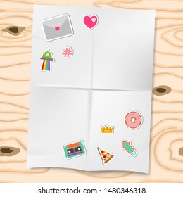 Patches or stickers isolated on white folded paper and wooden background vector illustration. Set of patches with heart, letter, pitzza and retro cassete.