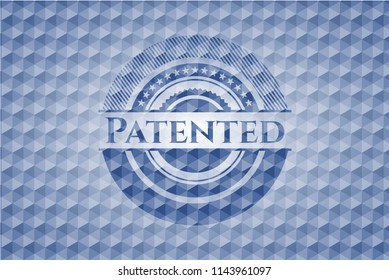 Patented blue emblem or badge with geometric pattern background.