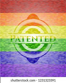 Patented emblem on mosaic background with the colors of the LGBT flag