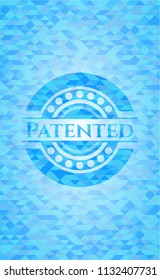 Patented sky blue emblem with triangle mosaic background