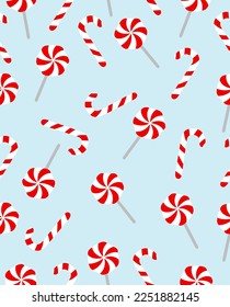 Patern of New Year's candies on a blue background