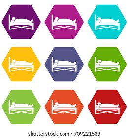 Patient in bed in hospital icon set many color hexahedron isolated on white vector illustration