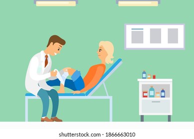 Patient with injured leg on a consultation with a doctor. Podiatrist puts a bandage on the knee of a girl. Woman lies on the bed and looks at the man. Girl and doctor communicate in the hospital