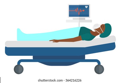 Patient lying in bed with heart monitor.