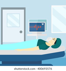 Patient lying in hospital bed with heart monitor.