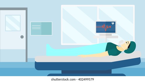 Patient lying in hospital bed with heart monitor.