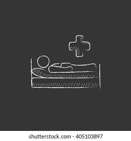 Patient lying on bed . Drawn in chalk icon.