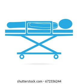 Patient on stretcher medical blue icon, medical concept