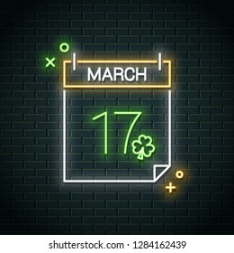 Patrick day neon calendar. 17 march Happy Patricks Day neon sign on wall background