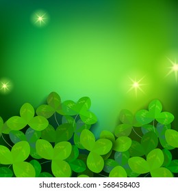 Patricks day green background with light and clover.