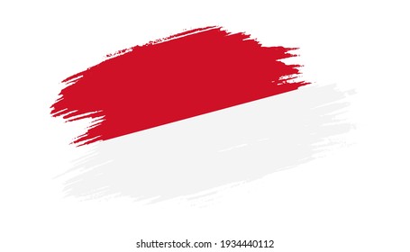 Patriotic of Monaco flag in brush stroke effect on white background