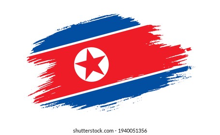 Patriotic of North Korea flag in brush stroke effect on white background