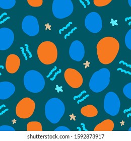 The pattern is abstract with color orange and blue spots on a dark background. For textile, background, wrapping paper, Wallpaper, fabric.