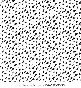 Pattern abstract geometry triangles broken black in chaos. The triangular shape of the small figures is directed diagonally on a white background. Simple chaos in a seamless texture