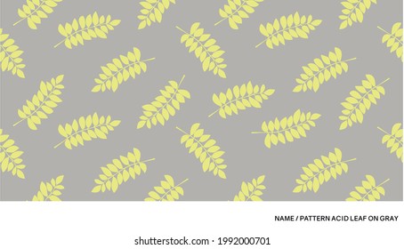 PATTERN WITH ACID COLOUR LEAF ON THE GRAY BACKGROUND