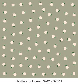 a pattern of apples with leaves on a green background