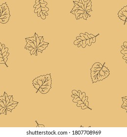 Pattern autumn leaves on an orange background