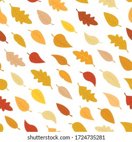 pattern of autumn leaves, orange, yellow, brown fallen leaves on a white background