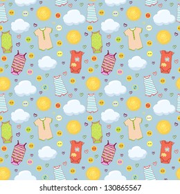 Pattern with baby clothes and blue sky, sun and clouds