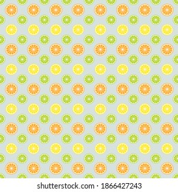 Pattern or background with multi-colored (lime green, yellow lemon, orange) citrus fruits for the design.