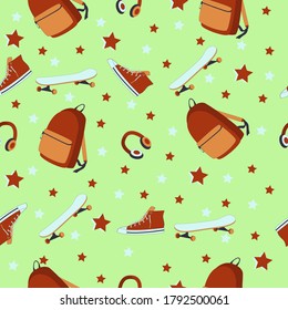 Pattern with a backpack, lightboard, boots and sneakers on a green background
