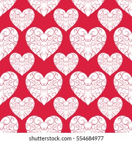 The pattern of the beautiful white openwork hearts on a bright red background. Valentine's Day. Holiday packages. Seamless image.