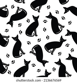 Pattern with black cats and traces on white background. Vector illustration.