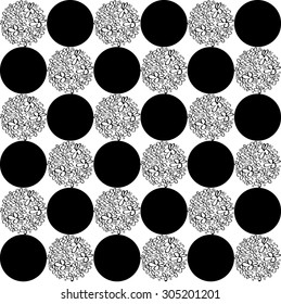 A pattern of black circles and circles of flowers.