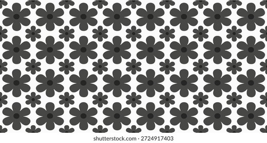 Un patrón de flores negras sobre un fondo blanco visto directamente desde arriba