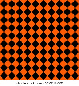 Pattern of black and orange rhombuses. Diagonal checkered background. Diagonal Chess pattern. Argyle plaid. Seamless fabric texture. Vector illustration