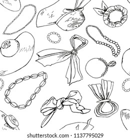 pattern of black and white accessories on a white background