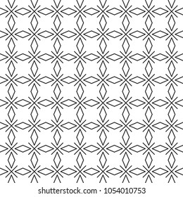The pattern is black and white geometric from rhombuses and crosses.