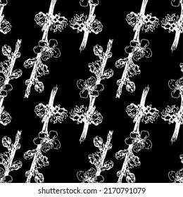 the pattern of a blooming apricot branch. Vintage Vector seamless pattern of a small flowering tree branch with a white line on black hand-drawn in the style of a sketch for a design template