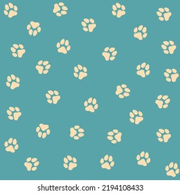 Pattern in blue with dog paws. The print is suitable for clothing, children's clothing, bed linen, icons, stickers.
