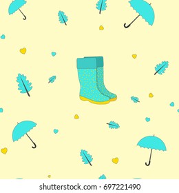 Pattern from blue rubber boots, umbrella and leaves on a yellow background. Vector illustration.