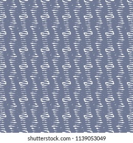 Pattern in blue and white made of short or twisted brush stroke. Textile print. Monochrome decorative background with wavy stripes. Vector illustration.