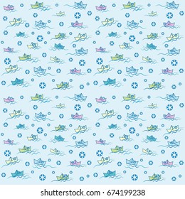 pattern boats waves and a life preserver on a blue background
