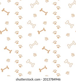 pattern with bone silhouettes and paw prints in doodle style and one line with colored beige spots. Can be used as a background, wallpaper, on fabric and for decorative decoration.